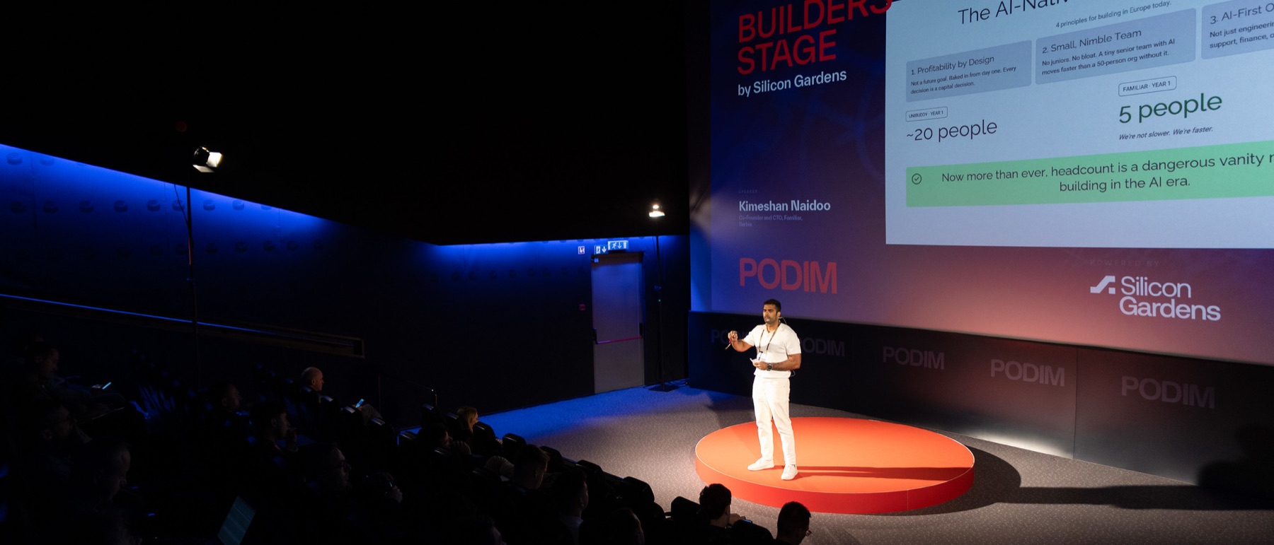 Kimeshan Naidoo speaking on the Builders Stage at PODIM